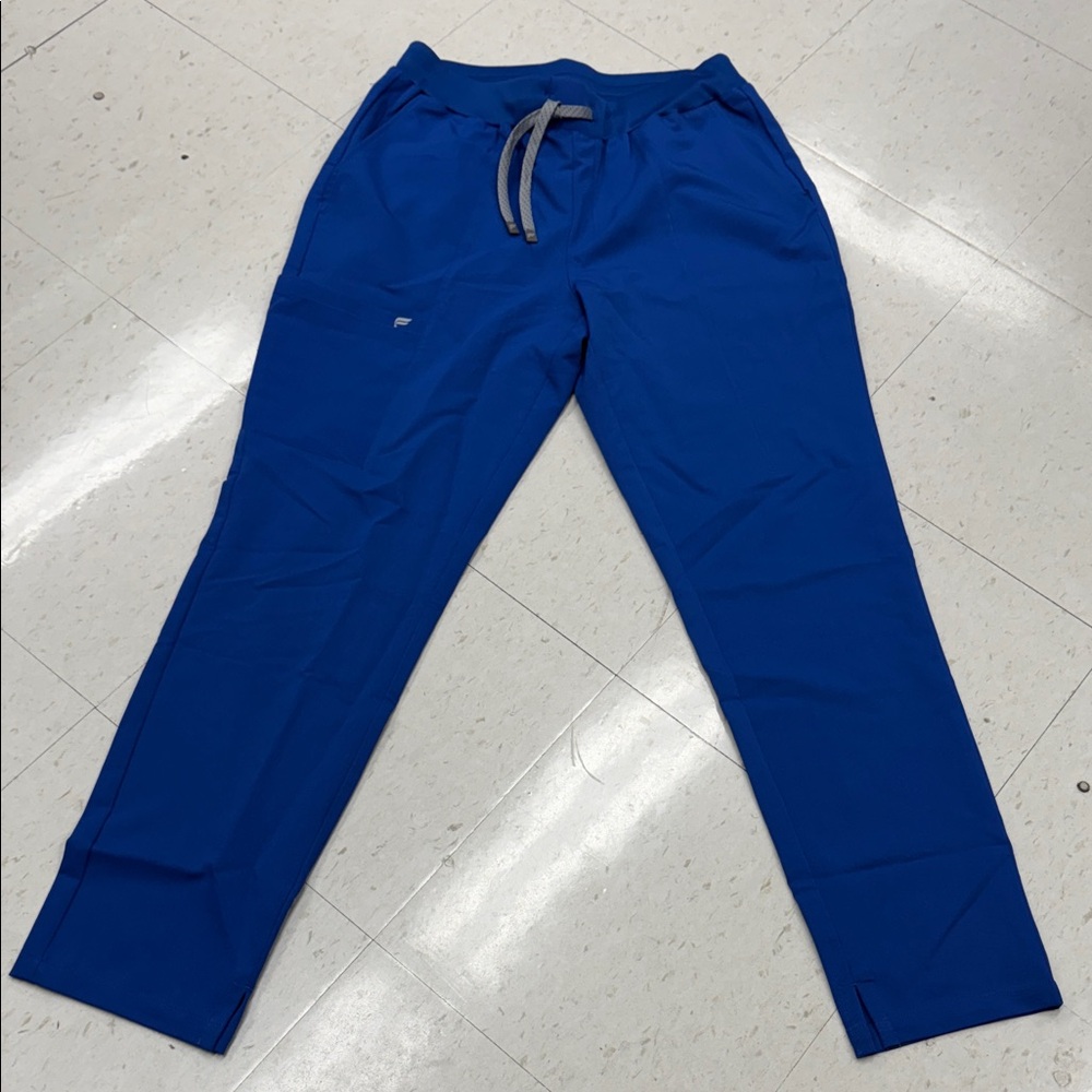 Brand new royal blue Fabletics straight leg scrub pants. Size Medium